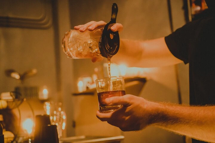 Craft rum cocktails being prepared at a San Juan bar